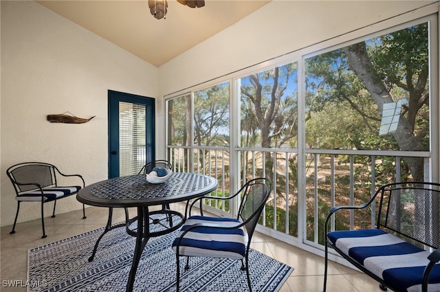 sunroom / solarium featuring ceiling fan