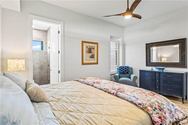 2008 SW 44th Ter, Cape Coral, FL 33914 - bedroom featuring wood finished floors, ceiling fan, and connected bathroom
