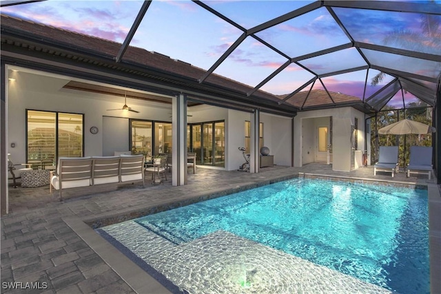 2008 SW 44th Ter, Cape Coral, FL 33914 - pool at dusk with an outdoor pool, an outdoor living space, and a patio