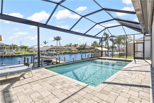 2008 SW 44th Ter, Cape Coral, FL 33914 - outdoor pool featuring boat lift, a boat dock, a patio area, and a water view