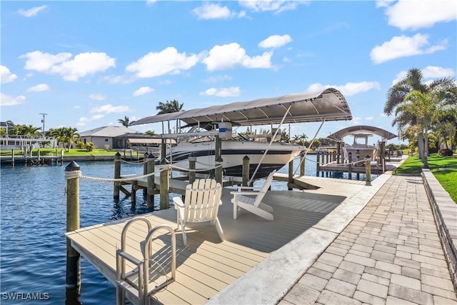 2008 SW 44th Ter, Cape Coral, FL 33914 - dock area featuring boat lift and a water view