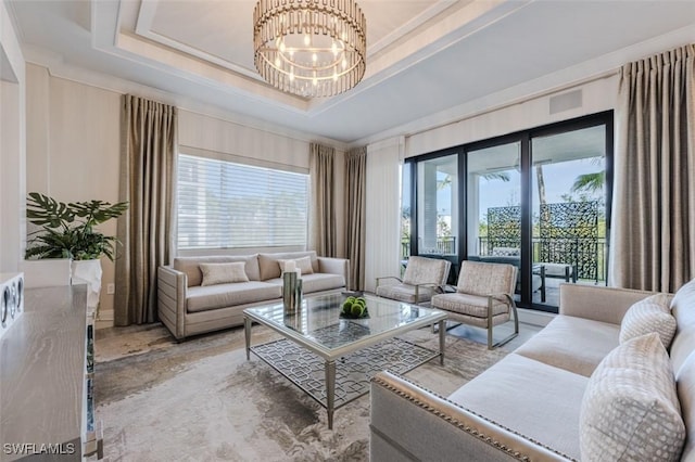 living area with a notable chandelier