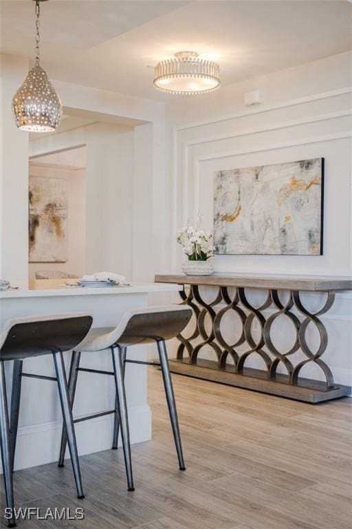 dining space with light wood-type flooring