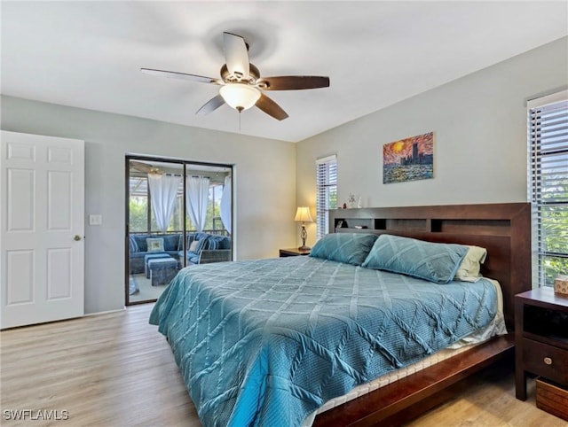 6030 Birnam Wood Ln, Fort Myers, FL 33908 - bedroom with multiple windows, wood finished floors, and access to outside