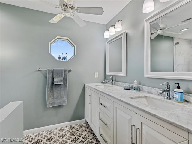 6030 Birnam Wood Ln, Fort Myers, FL 33908 - full bathroom featuring baseboards, a ceiling fan, a sink, and double vanity