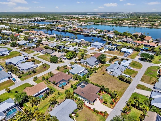 6030 Birnam Wood Ln, Fort Myers, FL 33908 - birds eye view of property with a residential view and a water view