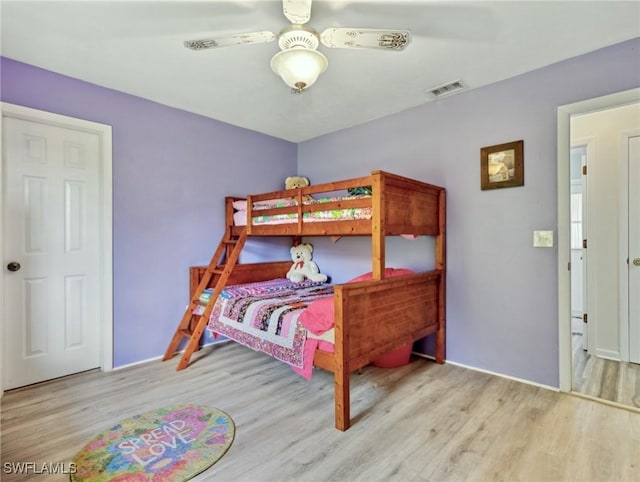 6030 Birnam Wood Ln, Fort Myers, FL 33908 - bedroom with visible vents, baseboards, and wood finished floors