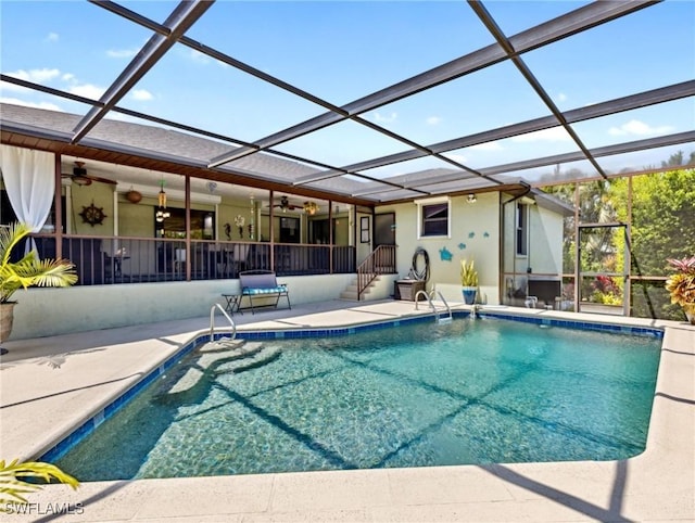 6030 Birnam Wood Ln, Fort Myers, FL 33908 - pool with glass enclosure, a patio, and ceiling fan