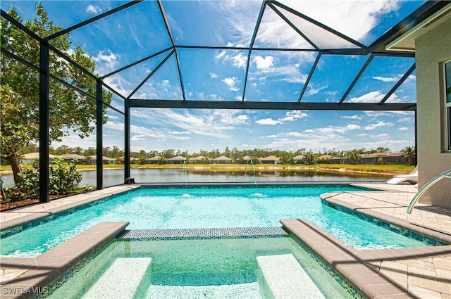 16733 Gilroy St, Bonita Springs, FL 34135 - view of swimming pool featuring a pool with connected hot tub, a patio area, and a water view