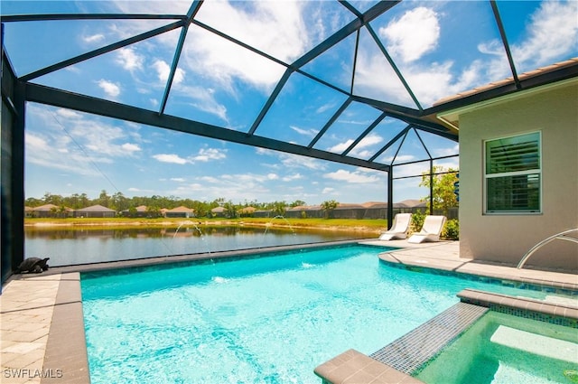 16733 Gilroy St, Bonita Springs, FL 34135 - view of pool with a patio, glass enclosure, a water view, and a pool with connected hot tub