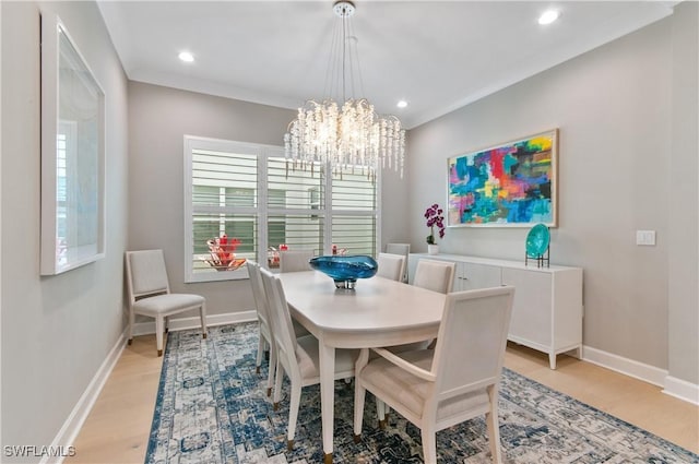 16733 Gilroy St, Bonita Springs, FL 34135 - dining area with healthy amount of natural light, baseboards, recessed lighting, light wood finished floors, and a chandelier