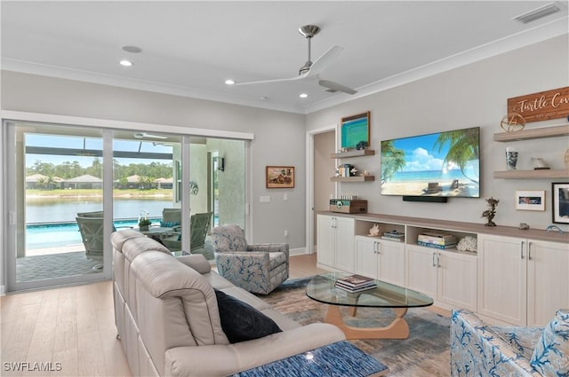 16733 Gilroy St, Bonita Springs, FL 34135 - living area with ceiling fan, healthy amount of natural light, crown molding, light wood-type flooring, and recessed lighting