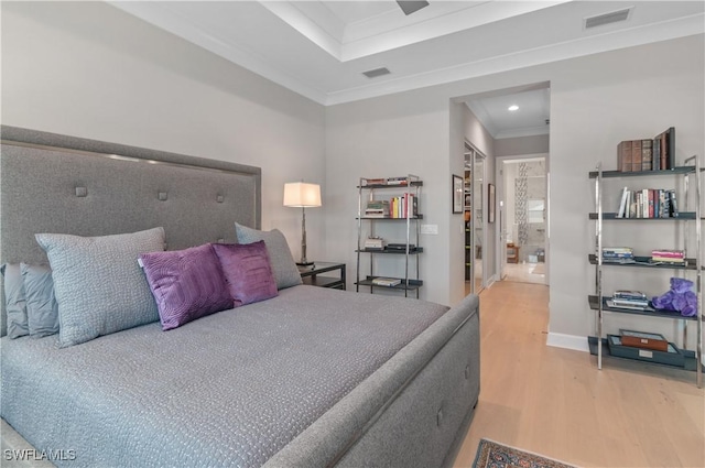 16733 Gilroy St, Bonita Springs, FL 34135 - bedroom with wood finished floors, crown molding, recessed lighting, a raised ceiling, and baseboards