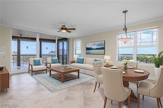 420 Cove Tower Dr Unit 804, Naples, FL 34110 - living area featuring ceiling fan, plenty of natural light, and light tile patterned floors