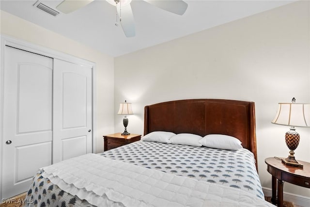 18580 Sandalwood Pointe Unit 101, Fort Myers, FL 33908 - bedroom featuring visible vents, a ceiling fan, and a closet