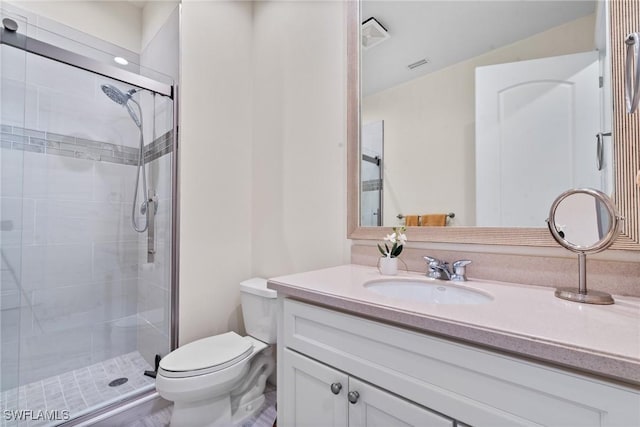 18580 Sandalwood Pointe Unit 101, Fort Myers, FL 33908 - full bathroom featuring visible vents, a stall shower, toilet, and vanity
