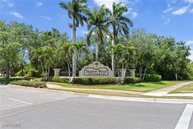 18580 Sandalwood Pointe Unit 101, Fort Myers, FL 33908 - community / neighborhood sign with a lawn