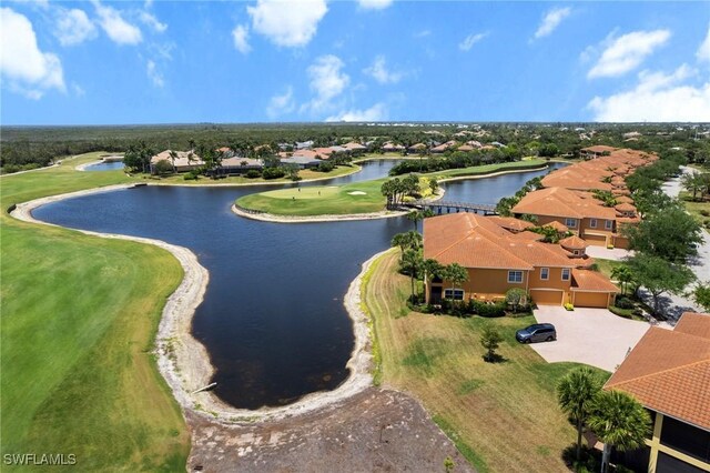 18580 Sandalwood Pointe Unit 101, Fort Myers, FL 33908 - birds eye view of property featuring golf course view, a residential view, and a water view