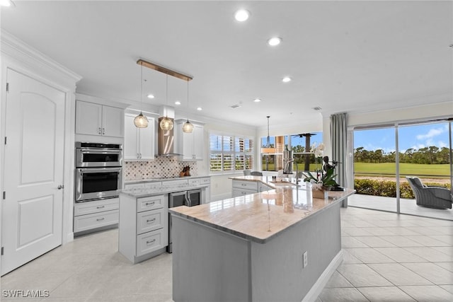 18580 Sandalwood Pointe Unit 101, Fort Myers, FL 33908 - kitchen featuring light tile patterned floors, decorative backsplash, a spacious island, stainless steel double oven, and recessed lighting