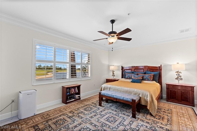18580 Sandalwood Pointe Unit 101, Fort Myers, FL 33908 - bedroom with baseboards, visible vents, ornamental molding, and a ceiling fan