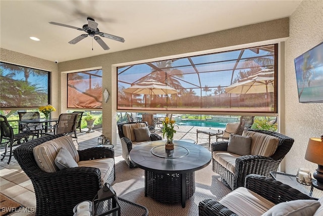 exterior space with plenty of natural light, a ceiling fan, and an outdoor living space