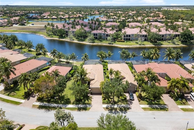 bird's eye view with a water view and a residential view