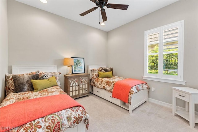 carpeted bedroom with recessed lighting, baseboards, and ceiling fan
