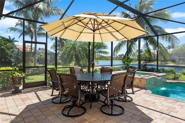 view of patio / terrace with a lanai, a water view, and a pool with connected hot tub