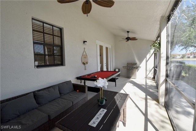 view of patio / terrace featuring outdoor lounge area, a ceiling fan, and a grill