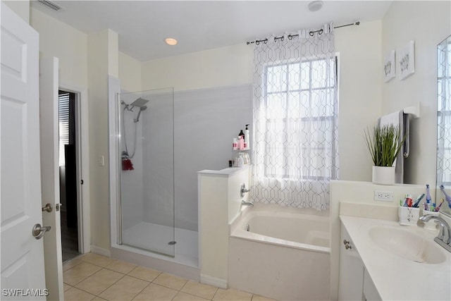 full bath featuring tile patterned flooring, visible vents, vanity, a bath, and a stall shower