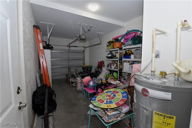 garage with a garage door opener and electric water heater