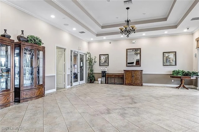 interior space with an inviting chandelier, visible vents, and french doors