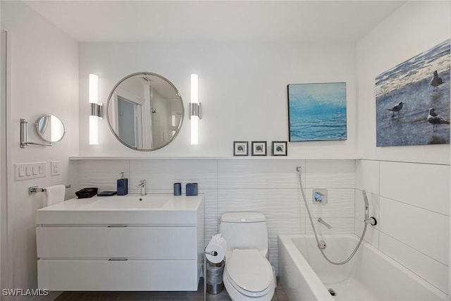 27310 Hickory Blvd, Bonita Springs, FL 34134 - bathroom featuring toilet, tile walls, a bathtub, and vanity