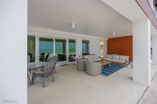 27310 Hickory Blvd, Bonita Springs, FL 34134 - view of patio / terrace with outdoor dining area and an outdoor living space
