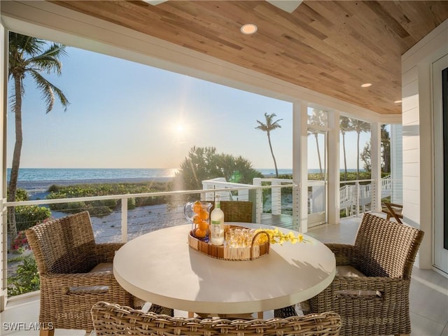 1072 S Seas Plantation Rd, Captiva, FL 33924 - sunroom / solarium featuring a water view