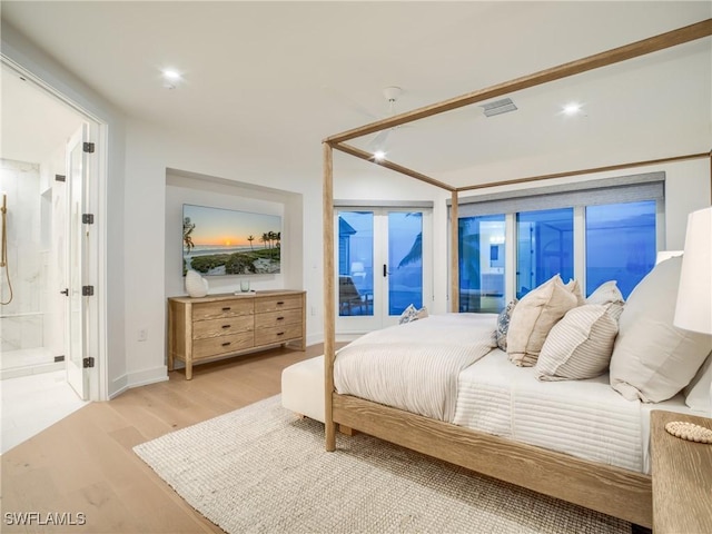 1072 S Seas Plantation Rd, Captiva, FL 33924 - bedroom with wood finished floors, recessed lighting, connected bathroom, and access to exterior