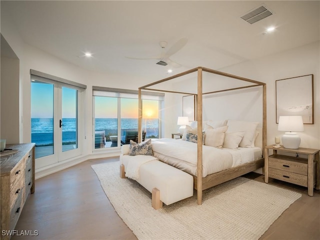 1072 S Seas Plantation Rd, Captiva, FL 33924 - bedroom featuring wood finished floors, access to exterior, a ceiling fan, and recessed lighting