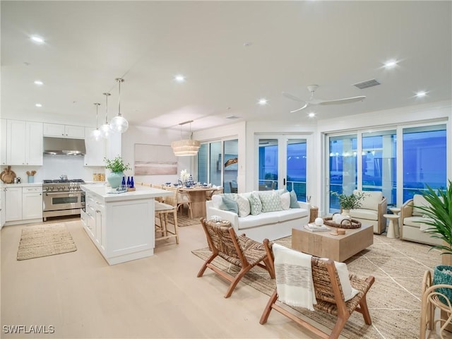 1072 S Seas Plantation Rd, Captiva, FL 33924 - living room featuring recessed lighting, light wood-type flooring, and a ceiling fan