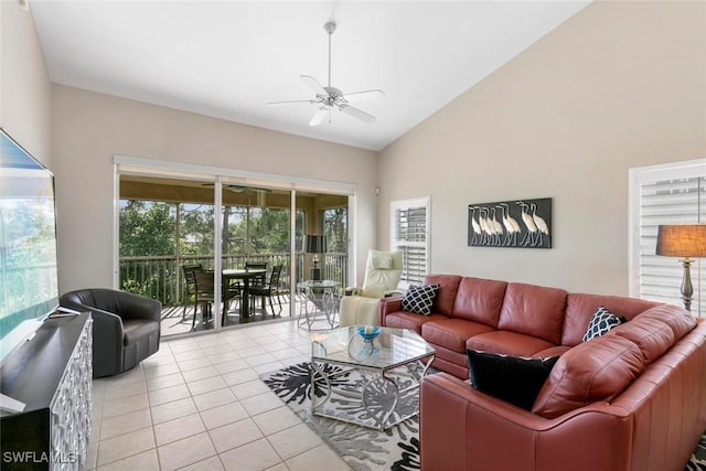 20131 Seagrove St Unit 408, Estero, FL 33928 - living room featuring ceiling fan, light tile patterned floors, and high vaulted ceiling
