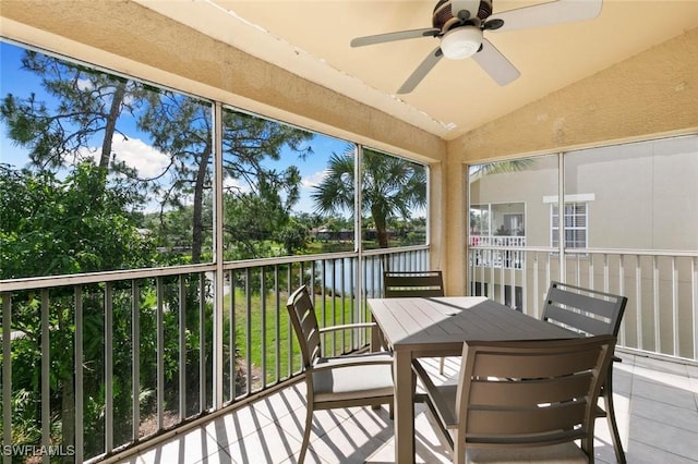20131 Seagrove St Unit 408, Estero, FL 33928 - sunroom / solarium featuring ceiling fan, lofted ceiling, outdoor dining area, and a water view