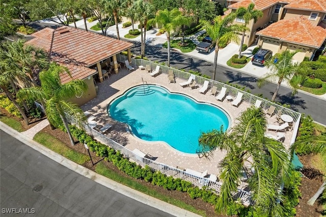 20131 Seagrove St Unit 408, Estero, FL 33928 - community pool with fence and a patio