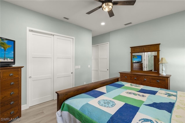 603 SW 53rd Ter, Cape Coral, FL 33914 - bedroom featuring a closet, light wood-type flooring, visible vents, and recessed lighting