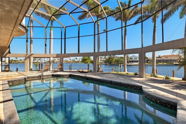 603 SW 53rd Ter, Cape Coral, FL 33914 - outdoor pool featuring a water view and a patio