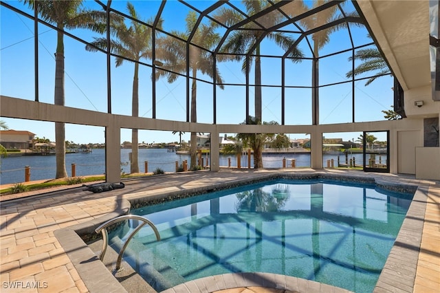 603 SW 53rd Ter, Cape Coral, FL 33914 - outdoor pool featuring a patio area, a water view, and glass enclosure