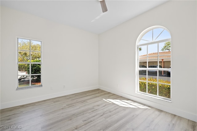 505 Mardel Dr Unit 106, Naples, FL 34104 - spare room featuring wood finished floors, ceiling fan, and baseboards