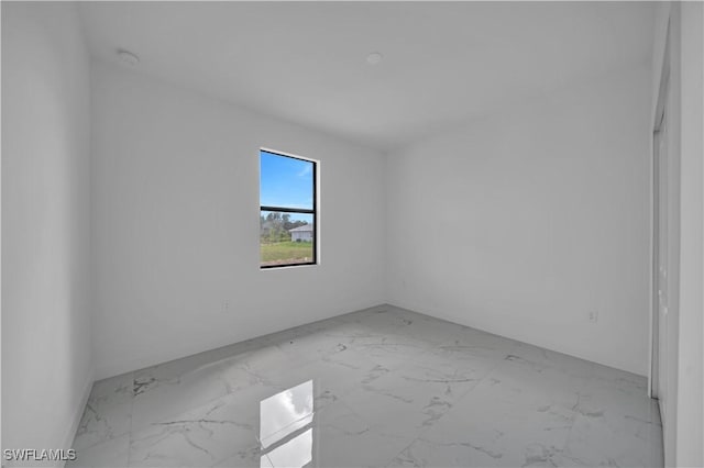4646 Leonard Blvd S, Lehigh Acres, FL 33973 - empty room with marble finish floors