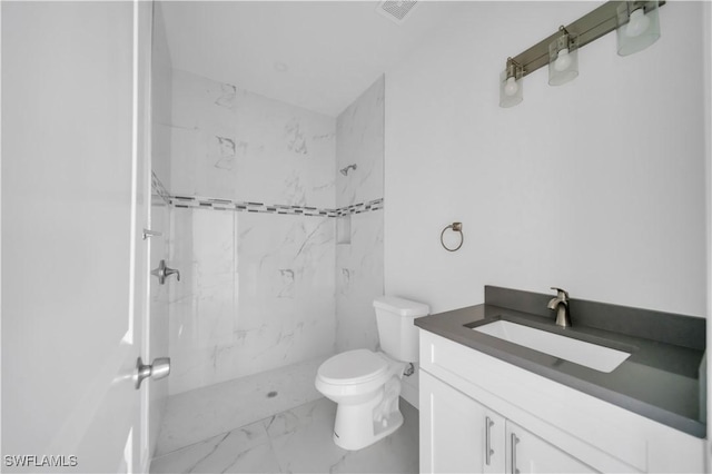 4646 Leonard Blvd S, Lehigh Acres, FL 33973 - full bath featuring marble look tile flooring, vanity, toilet, and a marble finish shower
