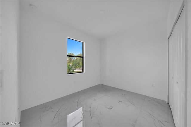 4646 Leonard Blvd S, Lehigh Acres, FL 33973 - empty room with marble finish floors