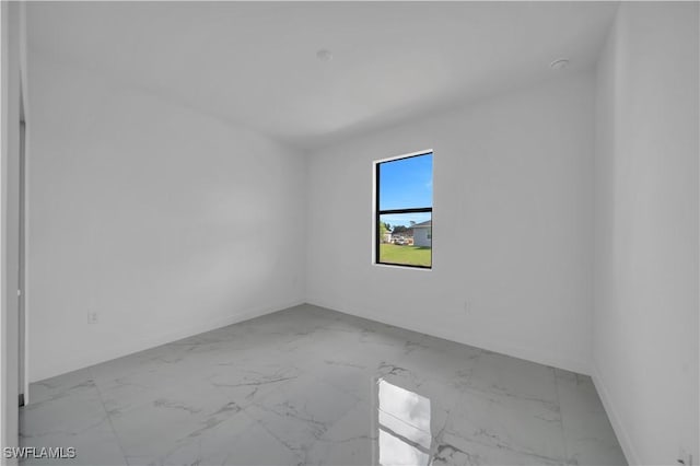 4646 Leonard Blvd S, Lehigh Acres, FL 33973 - empty room featuring marble finish flooring