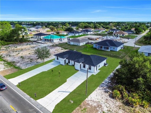 4646 Leonard Blvd S, Lehigh Acres, FL 33973 - aerial view of residential area with a pool